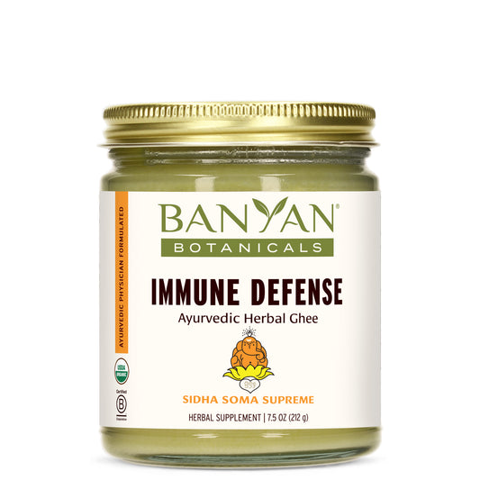 Jar of Banyan Botanical Immune Defense Ghee on a white background